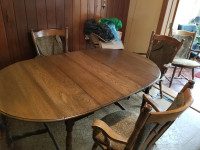 Oak gate leg table. Approx 100 years old and chairs
