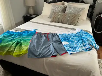 Mens XL bathing suits. Three for thirty, View more