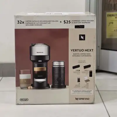 Brand new, Unopened. Model NO: ENV120CAECA Includes Aeroccino milk frother Makes coffee and espresso...
