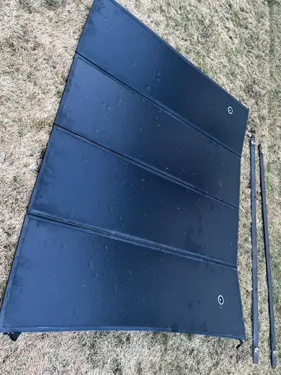 Truck bed cover from a ram 1500 with a 6’4” box. Some dents from hail. Works well. Located in Minden