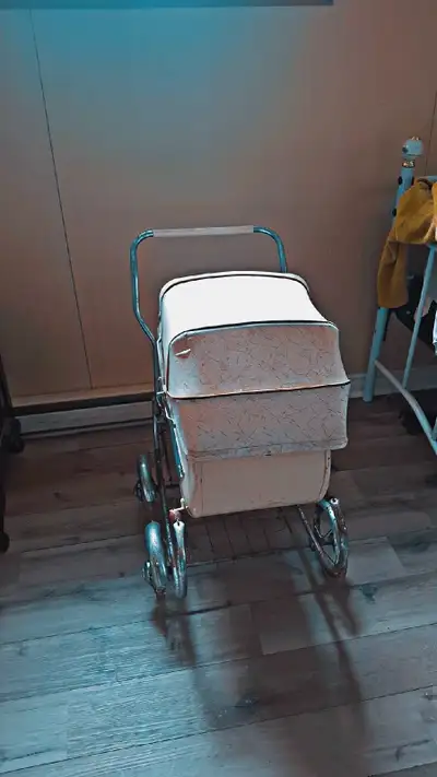 Antique stroller .