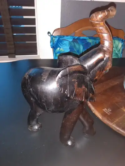 Dark brown all wood elephant Trunk.up..good luck $75