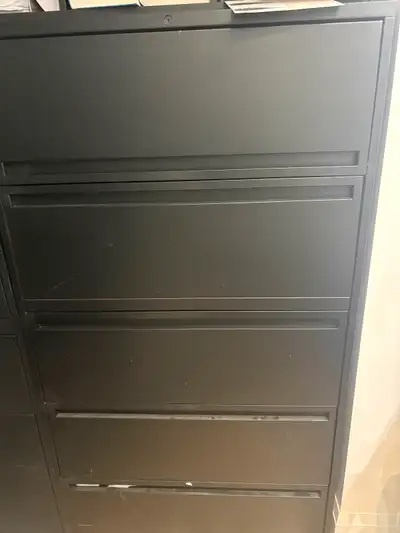 2 steel filing cabinets in good condition. 36 inches wide and 48, View more