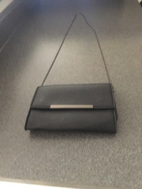 Black purse with chain strap
