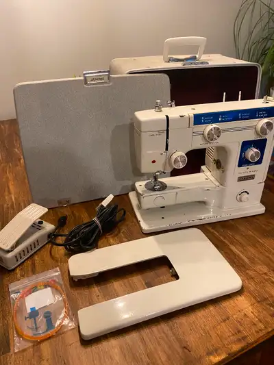 Janome sewing machine and case, View more