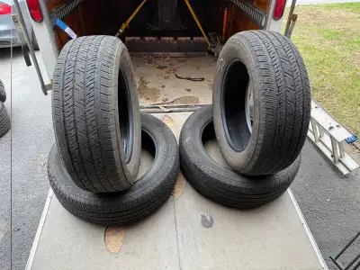 I'm offering a set of four Bridgestone Dueler H/T 685 tires, size 265/60R20 112H. These are all-seas...