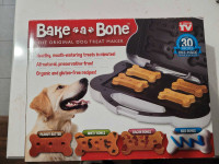 Bake a bone dog bone maker with recipes. Excellent condition.  