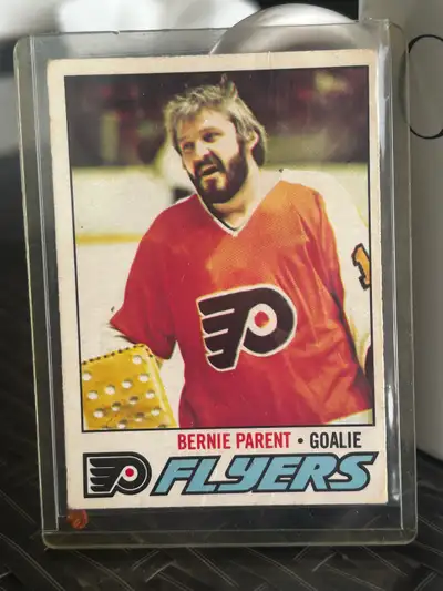 Own a piece of hockey history with this Bernie Parent Philadelphia Flyers hockey card! This vintage...