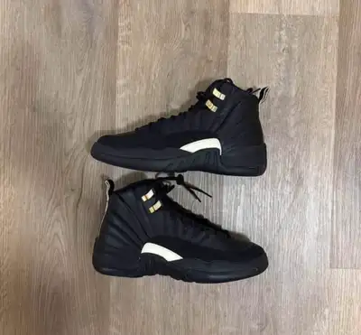 Step up your shoe game with these stylish Jordan 12 Retro Black shoes, perfect for adding a touch of...