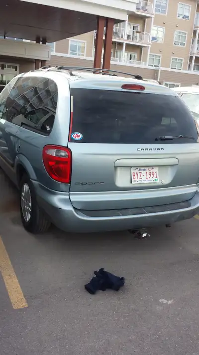 2006 Dodge Caravan. Runs great though slight repair needed (return power steering hose replacement).