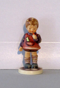 Hummel figure Delicious. 4 inches tall.
