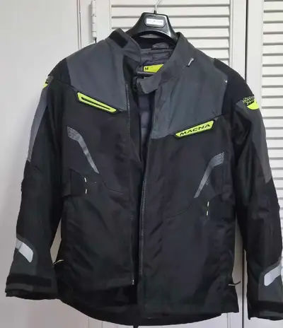 Men's medium black Macna motorcycle jacket with zip out liner. Pickup and cash only.