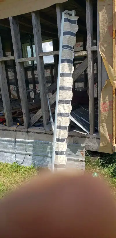 Awning for a cottage or house. Not meant for Rv's. Heavy duty, 98 inches long and 66 inches wide. $4...