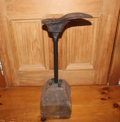 Old Cobbler's Shoe Repair Stand, View more