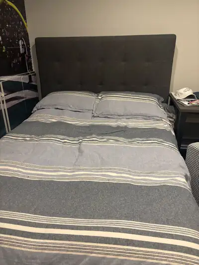 This double bed is ready for a new home and offers a comfortable night's sleep with its included mat...