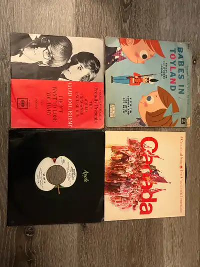 four vintage 45 records , View more