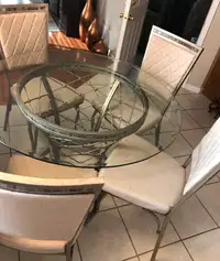 Glass top metal golden base with 4 chairs