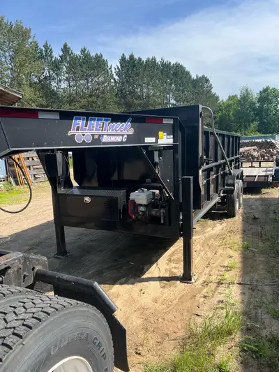2015 Fleet neck gooseneck dump trailer. 11 hp Honda for the hoist. 16 feet long with 4 foot sides an...