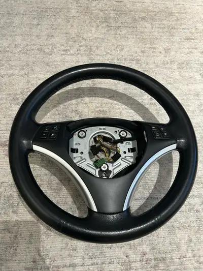 Fantastic condition, buttons are great, stitching is also great. NOT HEATED Clean wheel from my car,...