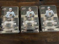 Sealed 2023-24 Upper Deck Series 2 NHL hockey card tins