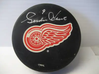 Signed Gordie Howe puck, View more