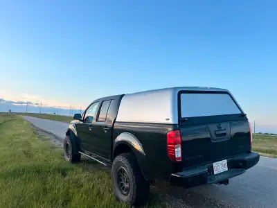 This Arrow canopy is designed for a Nissan Frontier, offering great protection and utility. This can...