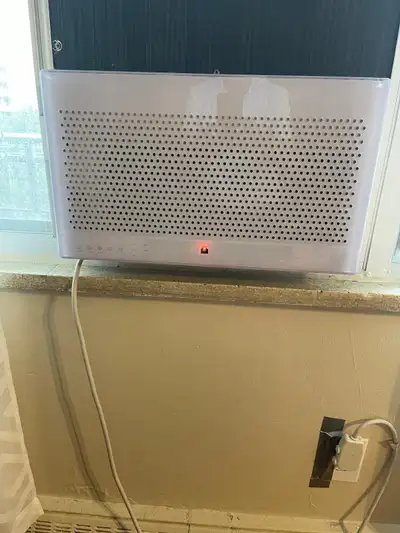 This is a used Quirky + GE A/C window unit, perfect for cooling down a small to medium-sized room wi...