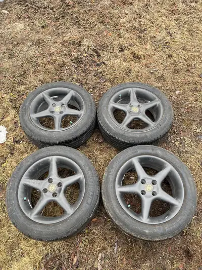 Selling my 16 inch Mags, bolt pattern 4x100 comes with Michelin Primacy mxv4, 2 at 8/32, 2 at 6/32....