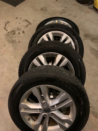 Tires on alloy rims in excellent condition