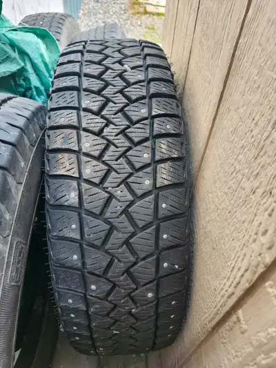 Studded tires (2) Goodyear command Only used 1/2 season 245/75/r16 ... 3 general grabber summer tire...