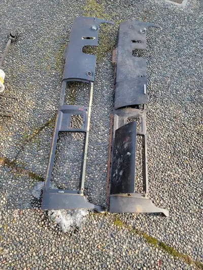 2 Bottom halves of dash, 1 has ashtray and glovebox