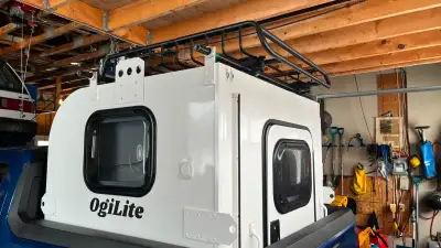 All in the bed truck camper with rear slide out . Designed for Ford Maverick but will fit newer F150...