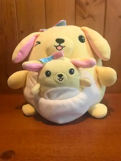 Squishmallow dog with removeable baby in pouch. About 8" high. In excellent condition. Pick up in Ba...