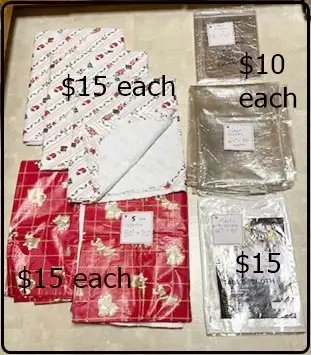 Christmas Table Cloths $15 and $10 each, View more
