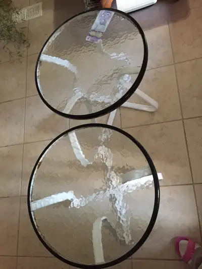 a pair of side tables, View more