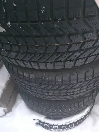 Snow tires and rims good condition .