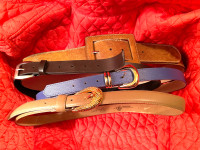  Four women's belts size medium and large