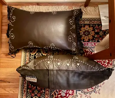 High quality, genuine leather Western themed throw pillows. Decorative silver toned conches and frin...
