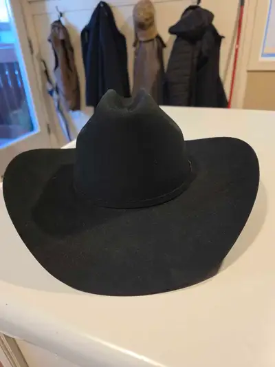 Two new Resistol cowboy hats for sale, just in time for Stampede! Both are size 7 3/8 oval; both are...