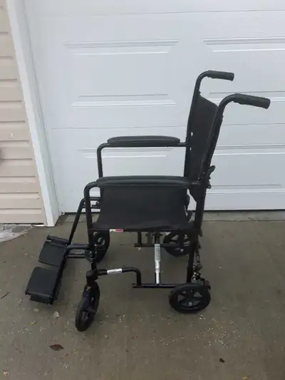 Transport Wheelchair by Drive. Child/Petite adult transport chair. Seat area measure 13" across by 1...