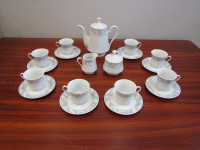 Tea Set, New, Teapot, milk, sugar containers, 8 cups and saucers