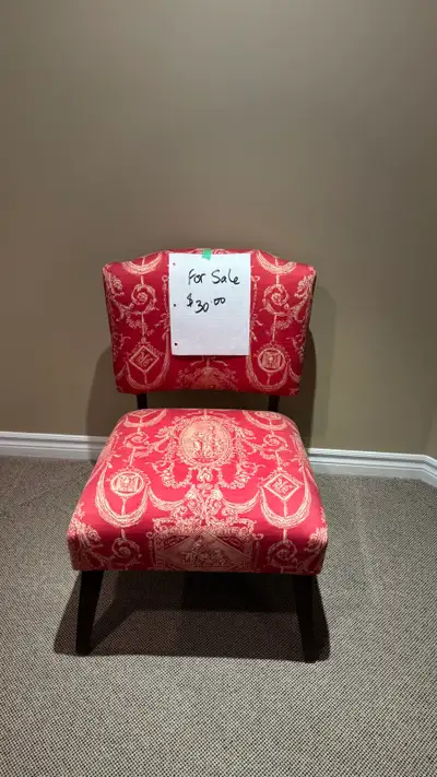 Red upholstered chair , View more