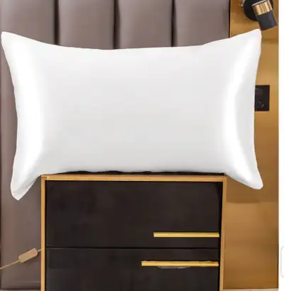 Indulge in the luxurious comfort of this SilkSilky pillowcase, crafted from 100% mulberry silk to en...