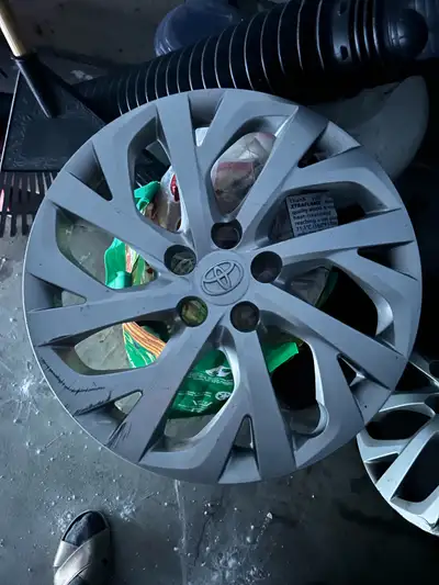 I am selling a set of 3 genuine Toyota Corolla hubcaps, perfect for replacing your missing or damage...