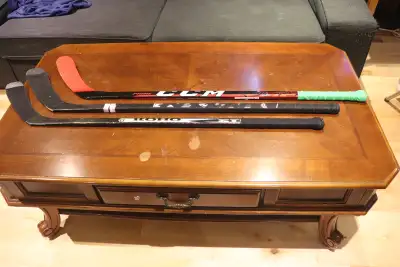 3 CCM / KOHO HOCKEY STICKS (RIGHT HAND) AND 2 BAUER HELMETS HOCK, View more