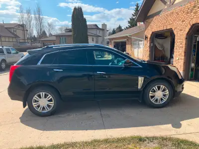 2014 Cadillac SRX. Fully loaded nice car tires good, glass good. Good on gas selling as we don’t nee...
