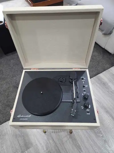 Arkrocket record player, model ARCP01. Line Out Ports: Features RCA jacks (labeled R and L) to conne...