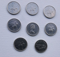 Canadian mint quarters, 1973 & 1999