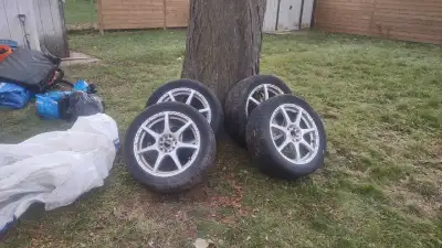 Selling used the whole set rims and tires universal rims 245 45 17 moving sale they were mounted on...
