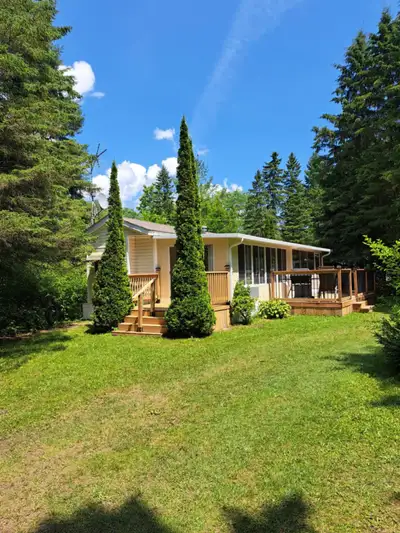 Cozy Cottager Like Trailer with Double Add-On-Rooms – Move In Ready! Escape to your own slice of par...